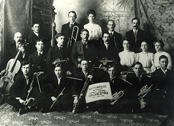 Historical black and white photo of the church band